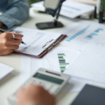 Business professionals validating financial records for UAE Peppol E-invoicing compliance readiness
