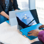 Professional using a laptop for microsoft dynamics e-invoicing UAE setup and digital invoice workflow management