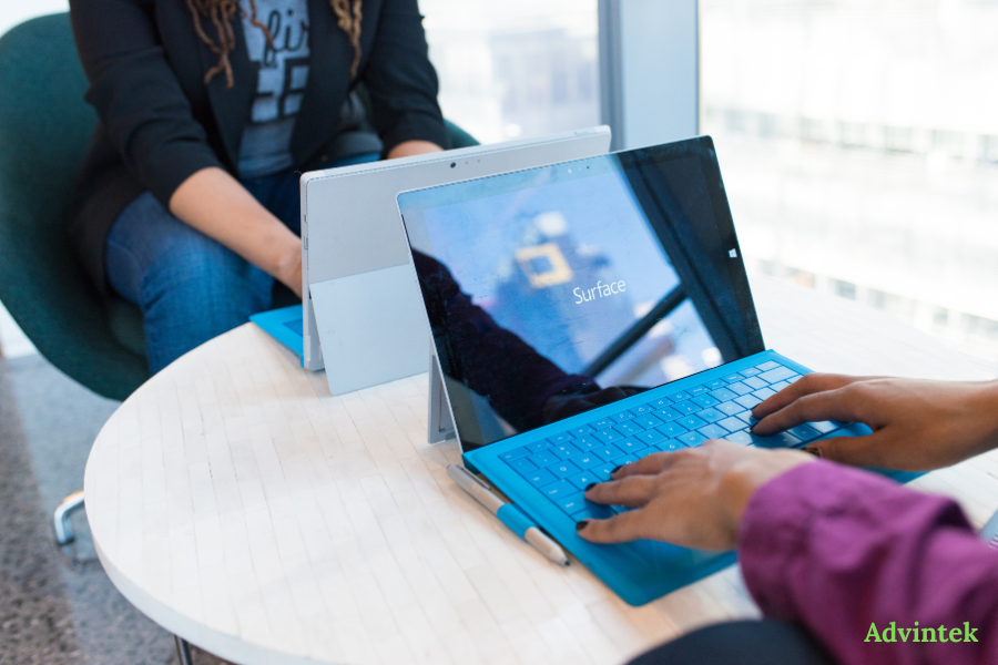 UAE E-Invoicing for Microsoft Dynamics 365: What Finance Teams Need to Know 1 Professional using a laptop for microsoft dynamics e-invoicing UAE setup and digital invoice workflow management