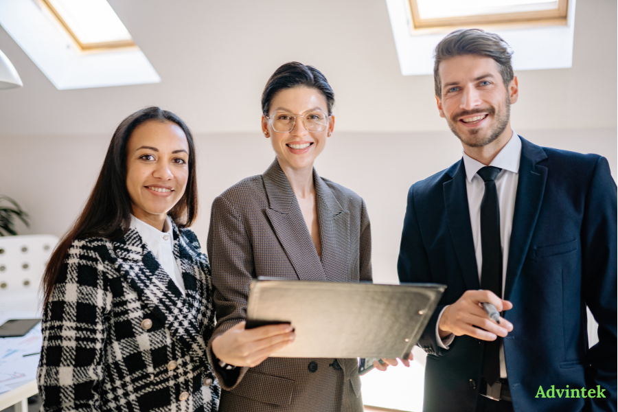 UAE E-Invoicing for Microsoft Dynamics 365: What Finance Teams Need to Know 3 Business team reviewing finance documents for microsoft dynamics e-invoicing UAE and FTA ASP Peppol UAE compliance