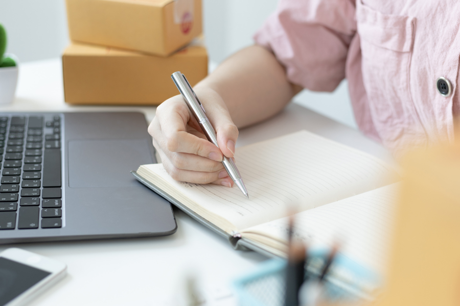 ASP Accreditation Just Got Harder: The New Two-Year Experience Rule and What It Means for Your Vendor Choice 2 vendor calculating expenses of the SME with laptop in front of her.