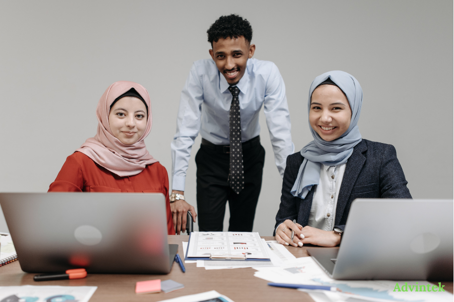 UAE E-Invoicing for QuickBooks and Zoho Books: Can Your Accounting Software Comply? 2 Finance professionals using laptops to manage accounting, invoice automation, and e-invoicing compliance with Advintek