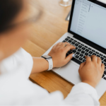 person UAE e-invoicing on laptop
