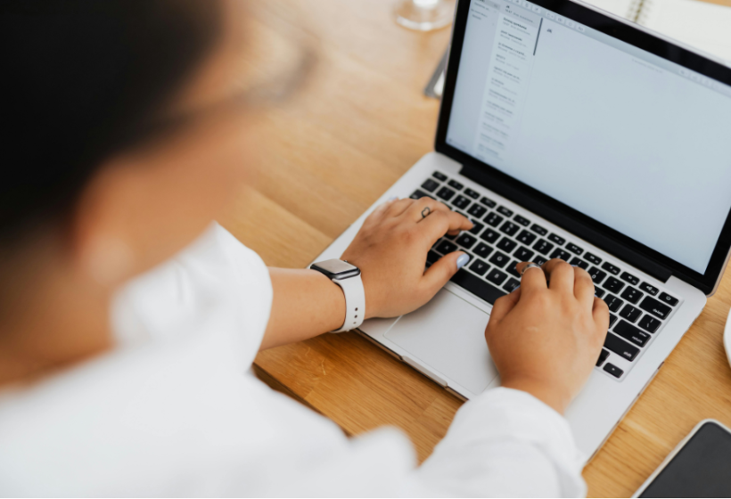person UAE e-invoicing on laptop